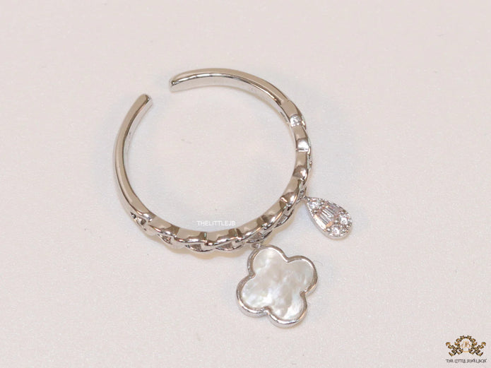 Platinum plated link chain ring with MOP clover and cz drop