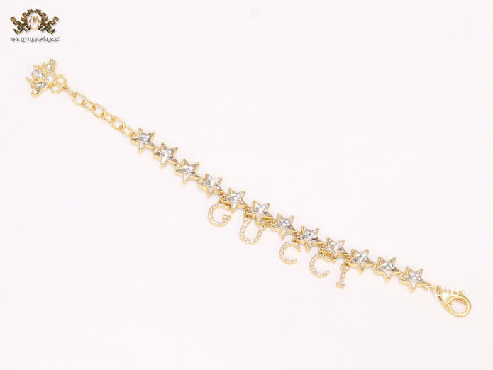 Double G and CZ stars gold charm bracelet