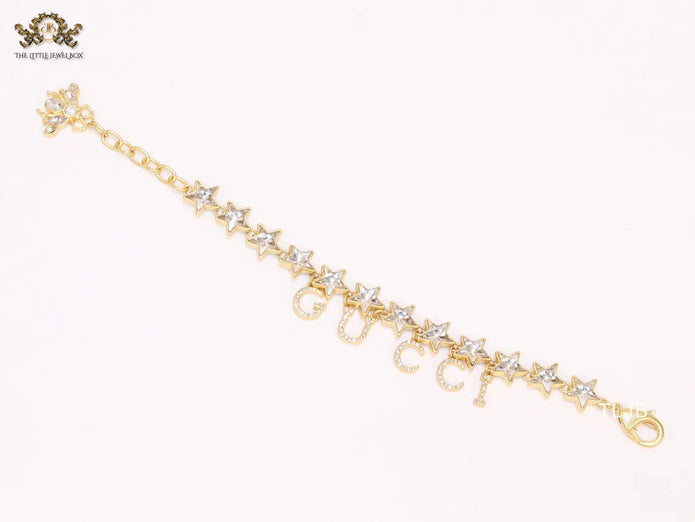 Double G and CZ stars gold charm bracelet