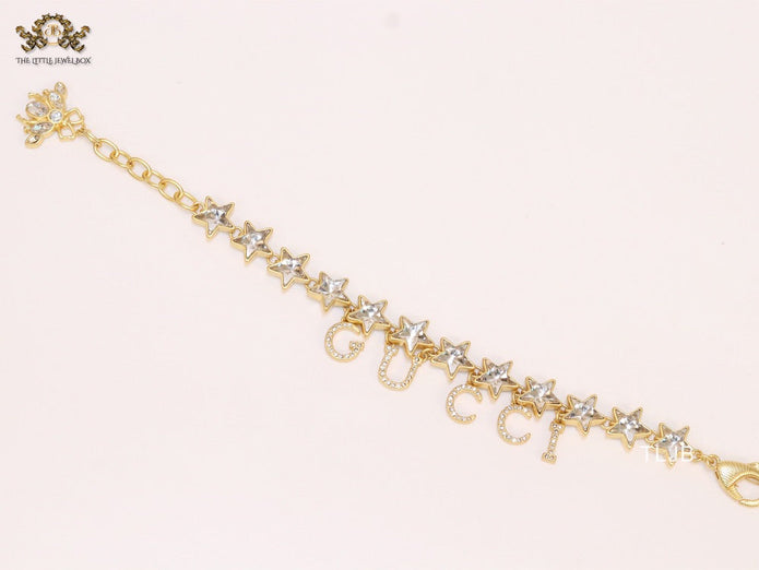 Double G and CZ stars gold charm bracelet