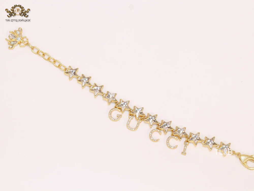 Double G and CZ stars gold charm bracelet
