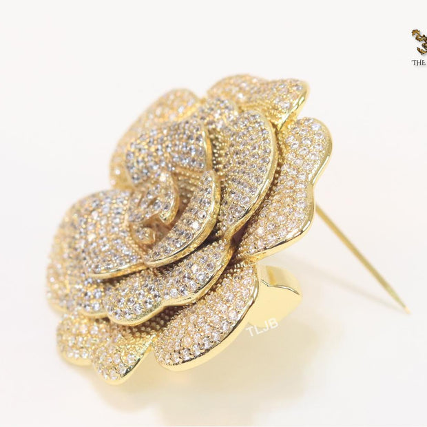 Double C gold & cz flower brooch