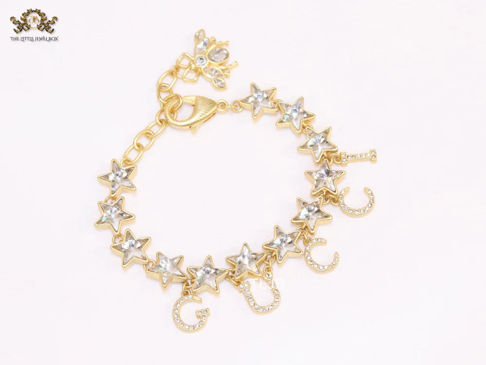 Double G and CZ stars gold charm bracelet