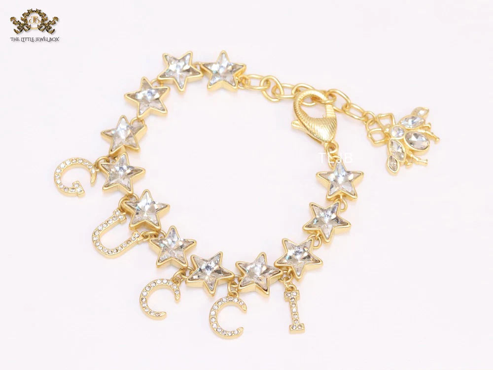 Double G and CZ stars gold charm bracelet
