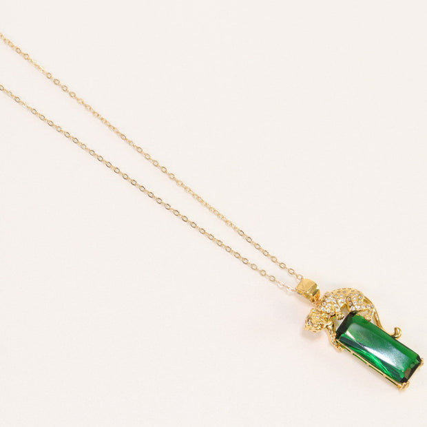 Gold plated leopard on green stone pendant necklace with cz