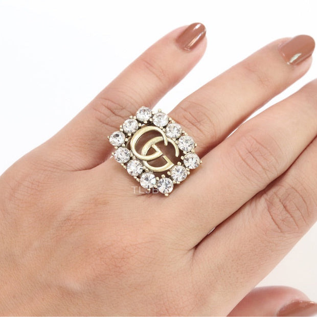 Double G gold plated CZ border ring