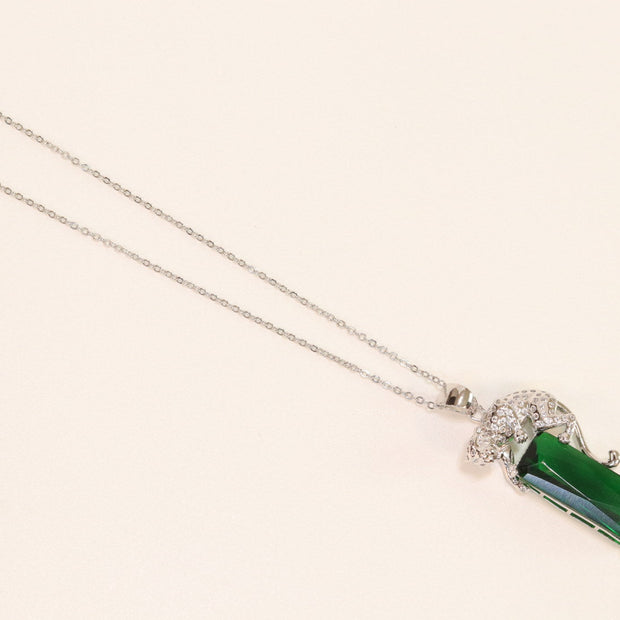 Platinum plated leopard on green stone pendant necklace with cz