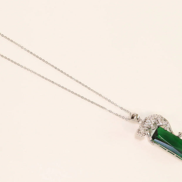 Platinum plated leopard on green stone pendant necklace with cz