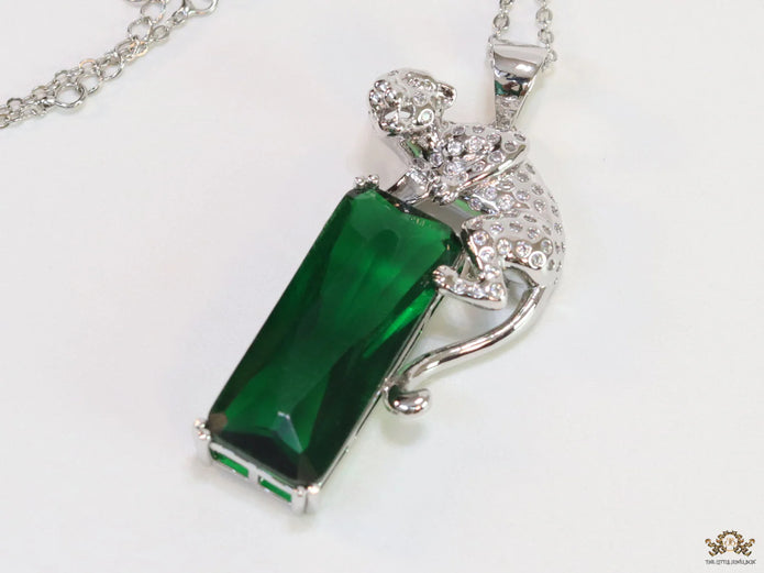 Platinum plated leopard on green stone pendant necklace with cz