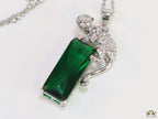 Platinum plated leopard on green stone pendant necklace with cz