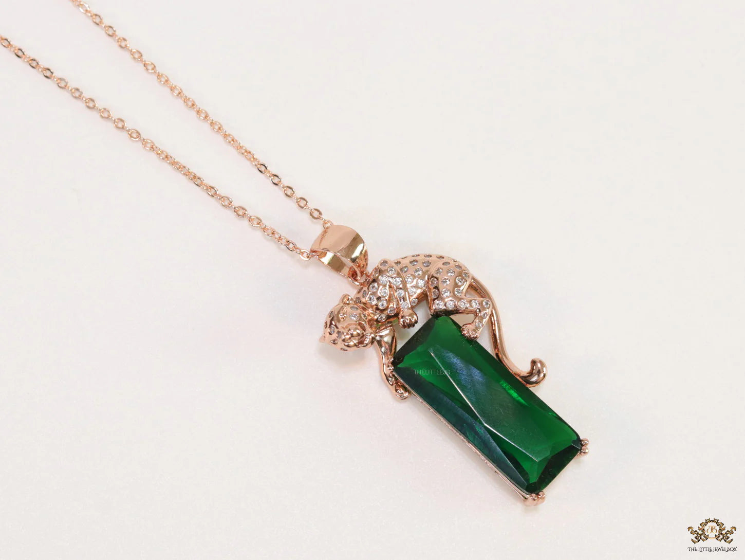 Rose gold plated leopard on green stone pendant necklace with cz