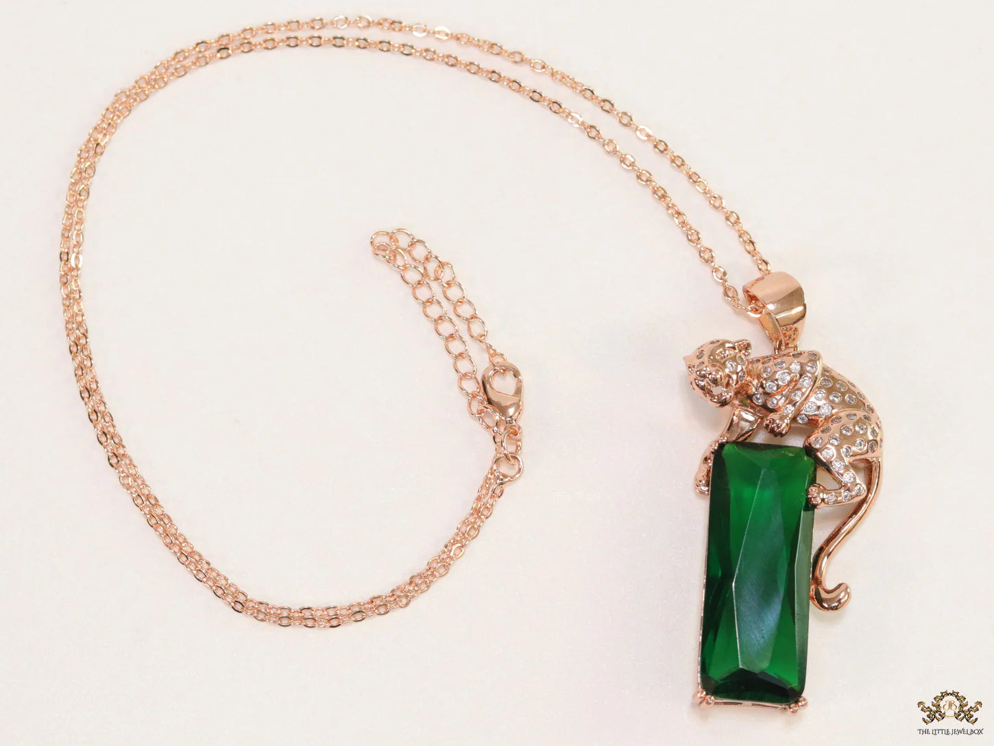 Rose gold plated leopard on green stone pendant necklace with cz