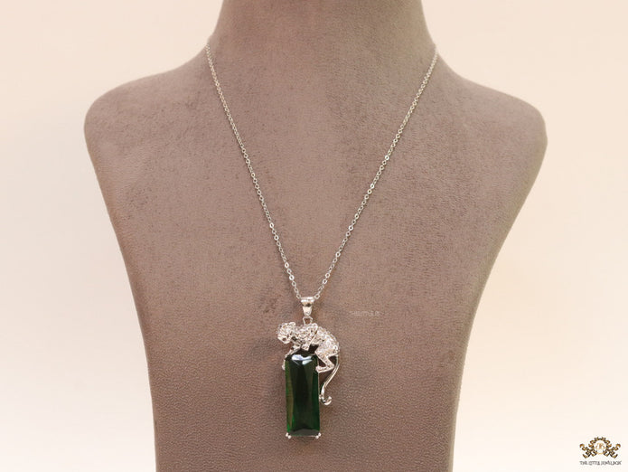 Platinum plated leopard on green stone pendant necklace with cz