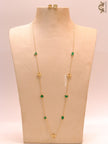 Emerald green clover heart and other shape charms on a sleek long gold plated chain with matching studs