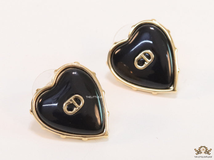 Heart shape black stud earrings with golden alphabets
