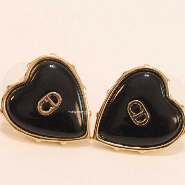Heart shape black stud earrings with golden alphabets