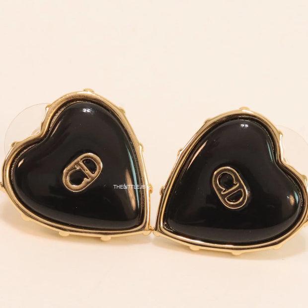 Heart shape black stud earrings with golden alphabets