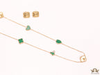 Emerald green clover heart and other shape charms on a sleek long gold plated chain with matching studs