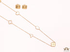 Pearl white clover heart and other shape charms on a sleek long gold plated chain with matching studs