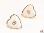 Heart shape white stud earrings with golden alphabets