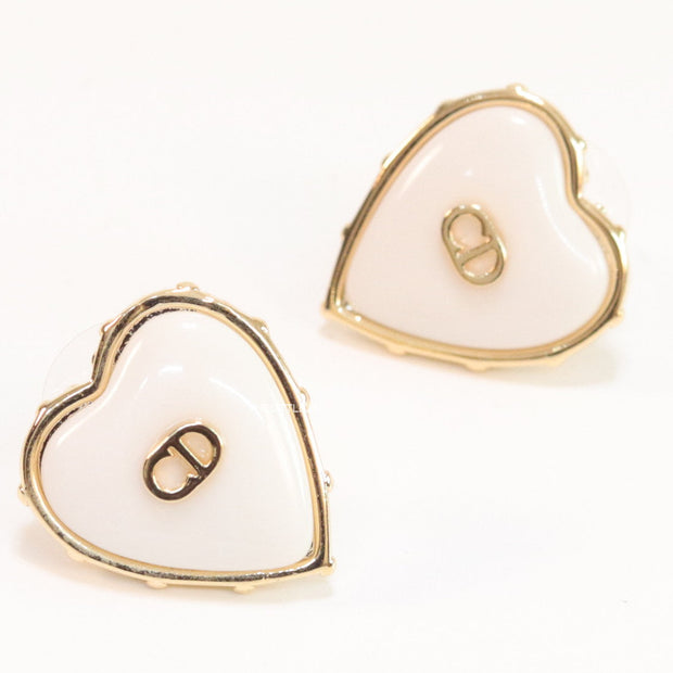 Heart shape white stud earrings with golden alphabets