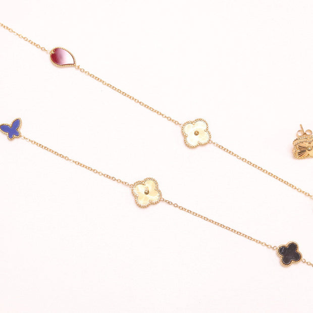 Multi colour clover heart and other shape charms on a sleek long gold plated chain with matching studs