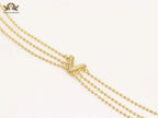 Alphabet V triple layered gold bracelet