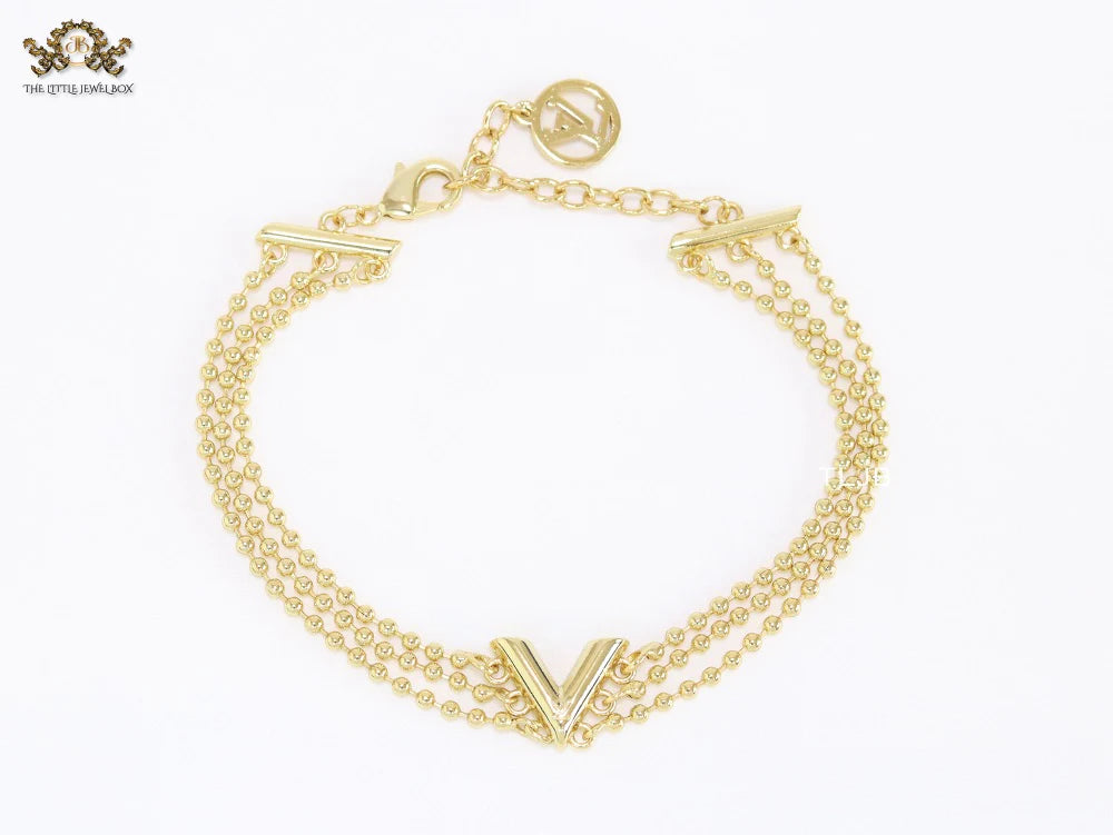 Alphabet V triple layered gold bracelet