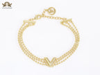 Alphabet V triple layered gold bracelet