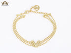Alphabet V triple layered gold bracelet