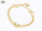 Alphabet V triple layered gold bracelet