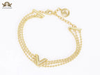Alphabet V triple layered gold bracelet