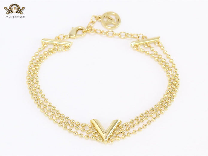 Alphabet V triple layered gold bracelet