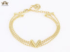 Alphabet V triple layered gold bracelet