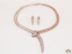 Rose Gold plated cubic zirconia stones ancient serpentine symbol necklace with matching studs