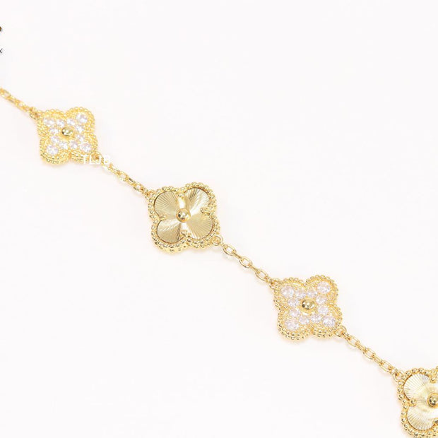 Cz and gold clover bracelet
