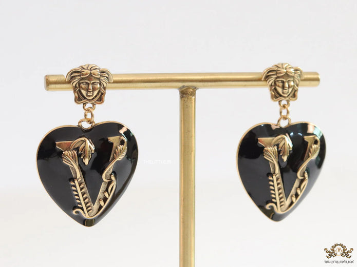 Gold plated medusa earrings with V motif black heart shape drop