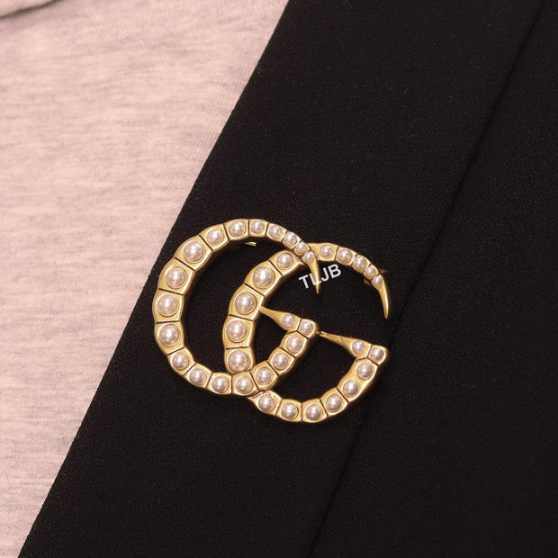 Double G pearl & gold brooch