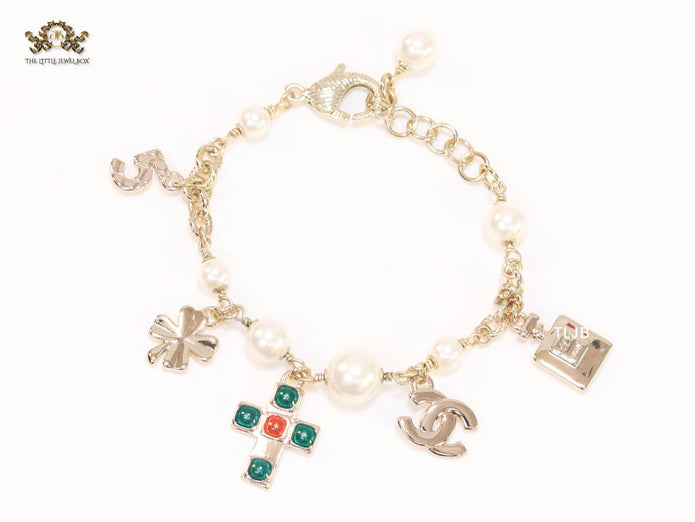 Pale Gold charms double c bracelet
