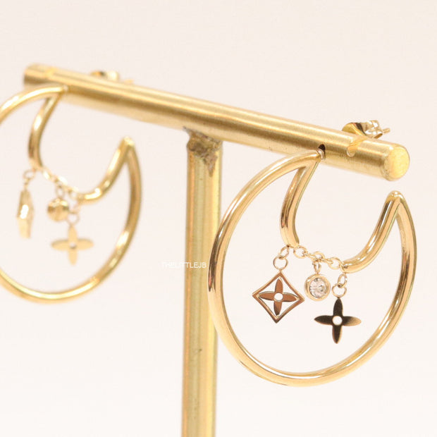 Designer golden hoops with various charms
