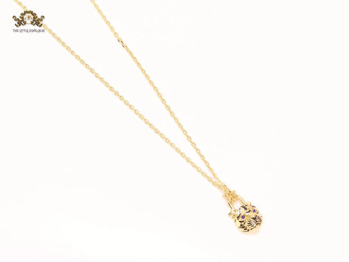 Sleek panther face gold chain