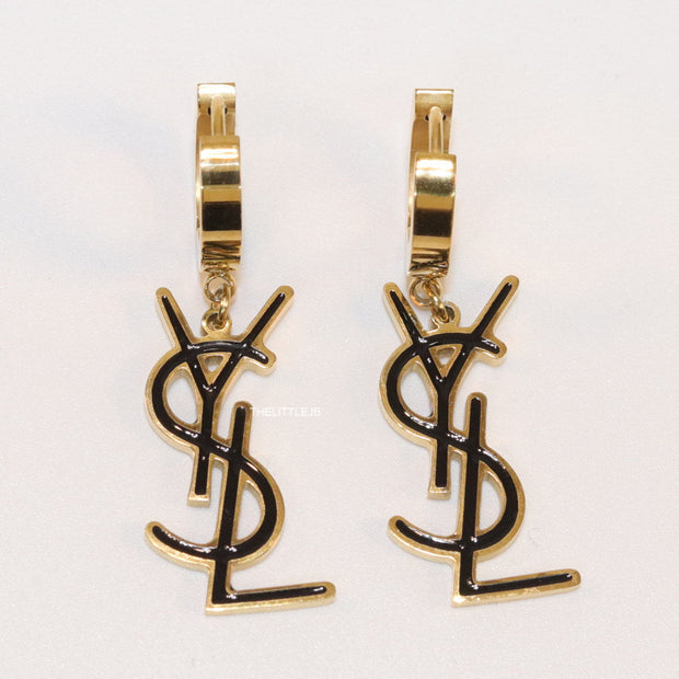 Tiny alphabet earrings in golden and black finish