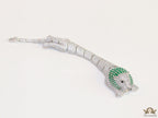 Platinum plated unique panther bracelet with cz and emerald green stones