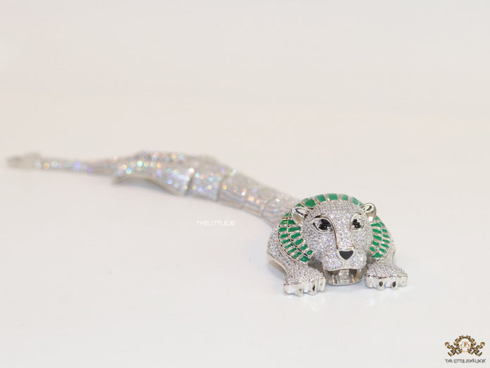 Platinum plated unique panther bracelet with cz and emerald green stones