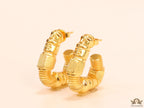 Gold plated open twisted screw shape earrings with numeric inscription