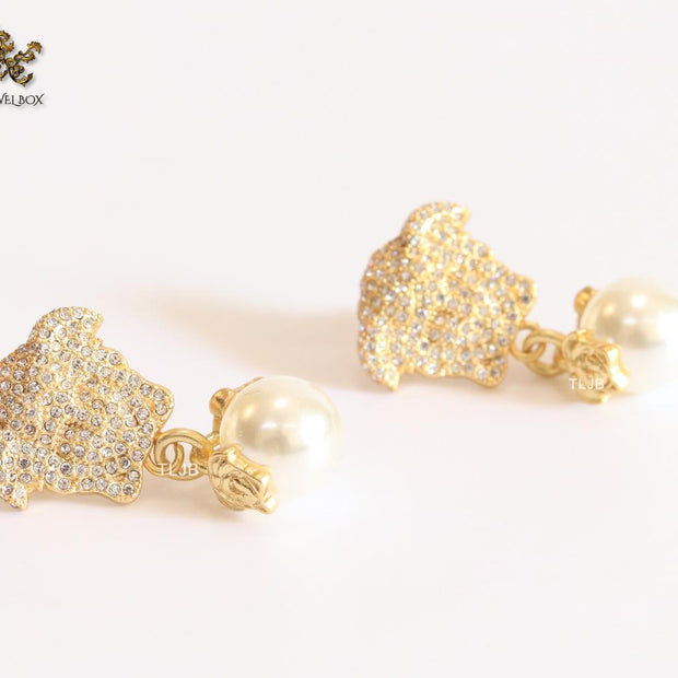Medusa & off-white pearl earrings with cz