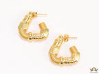 Gold plated open twisted screw shape earrings with numeric inscription