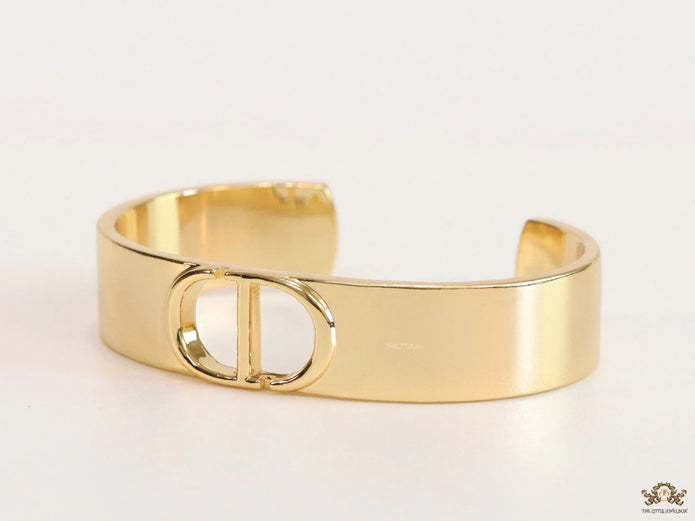 Broad Gold plated bracelet with C and D alphabet