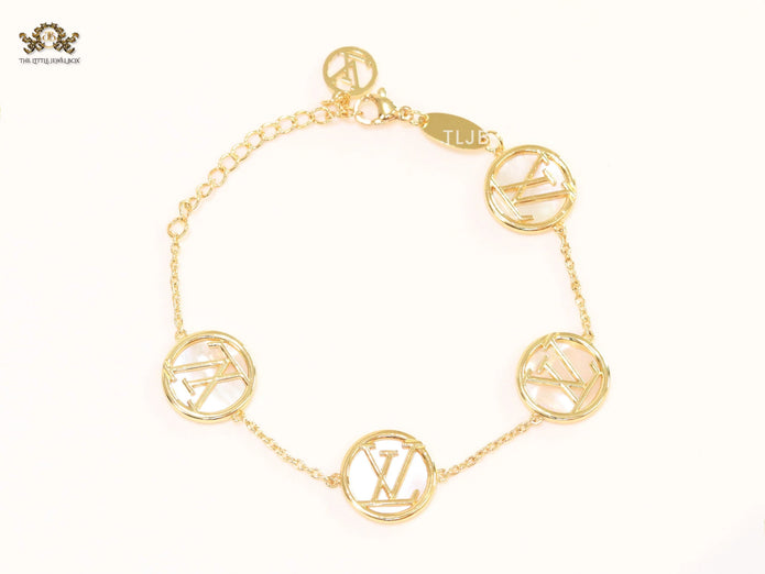 Alphabet L&V sleek gold chain bracelet