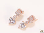 Rose gold Cz baguette earrings with heart shape cz drop